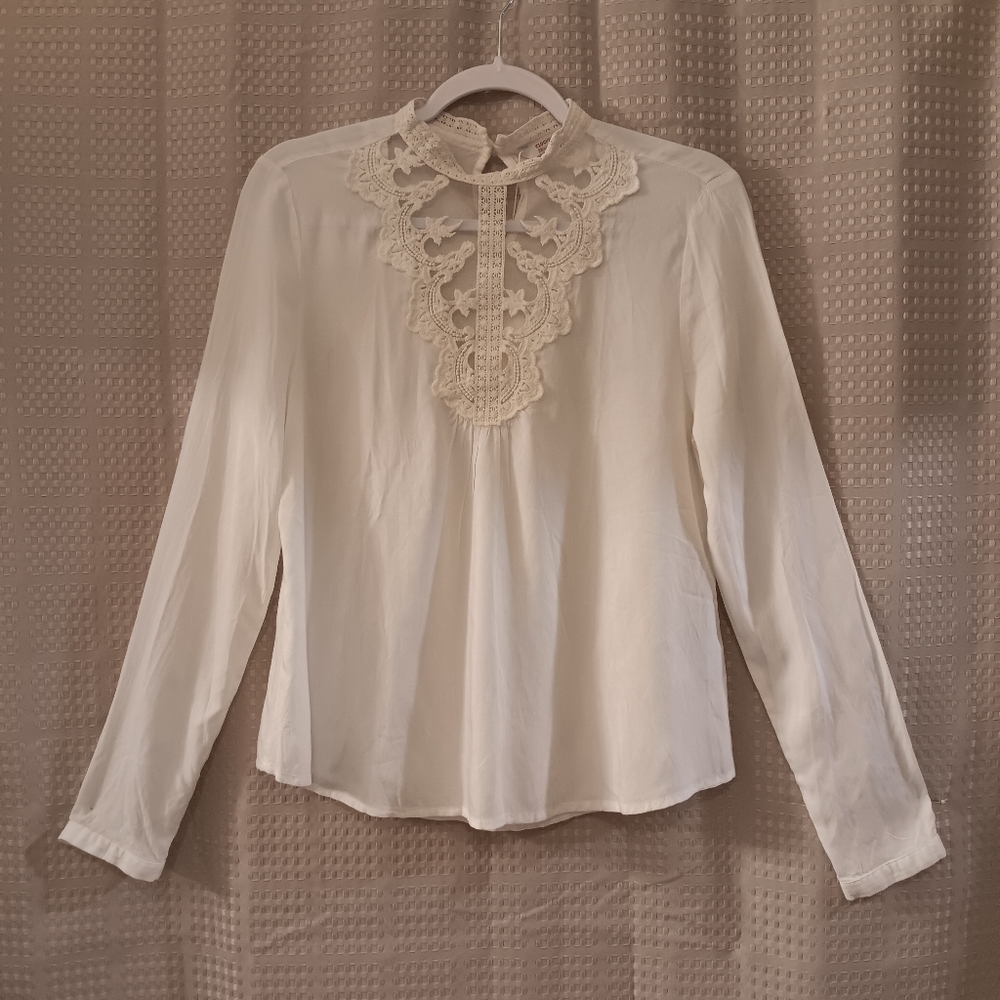 Clockhouse elements collection cream blouse.